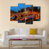 Canals in Amsterdam at night Multi panel canvas wall art