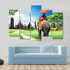 tourists on an elephant Multi panel canvas wall art