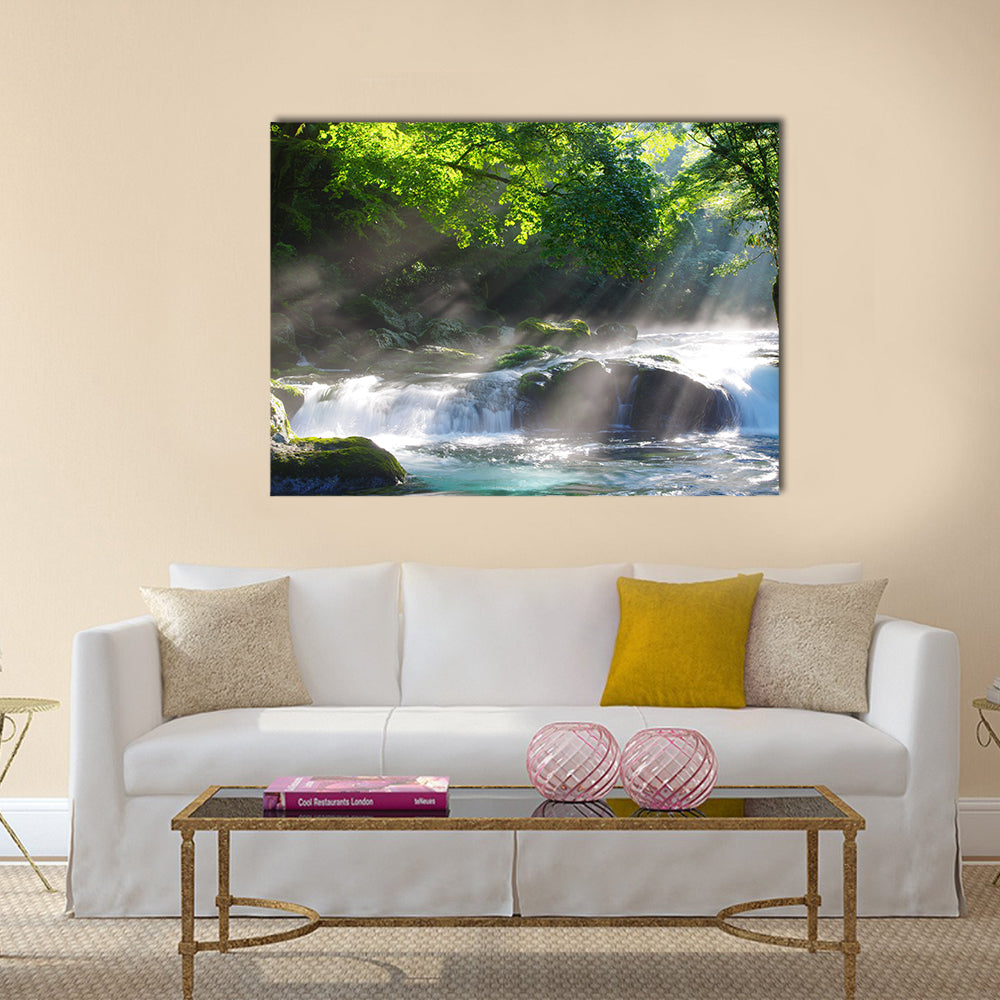 Mountain stream and shaft beam of light Multi Panel Canvas Wall Art
