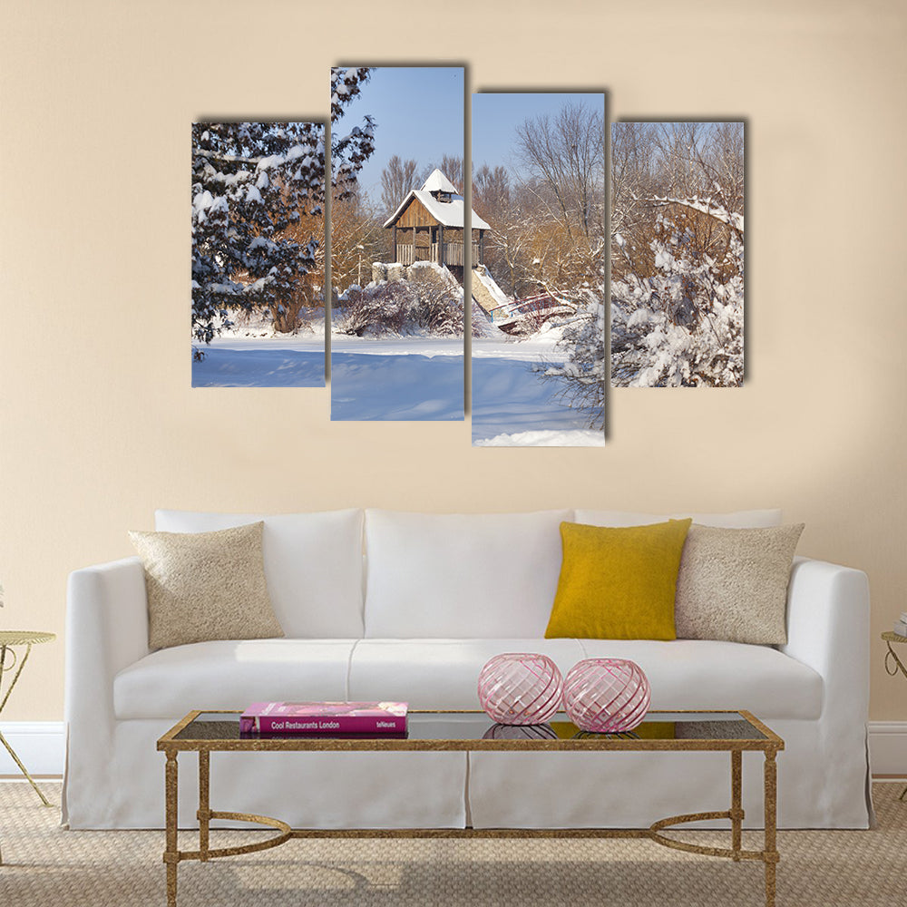 Snow-covered trees in the city park Multi panel canvas wall art
