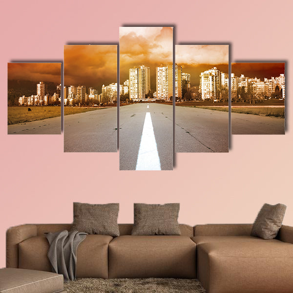 Empty highway- road heading to the city with dramatic dark stormy clouds Multi panel canvas wall art