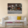 street lanterns in park at winter night Multi panel canvas wall art