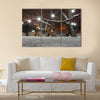 street lanterns in park at winter night Multi panel canvas wall art