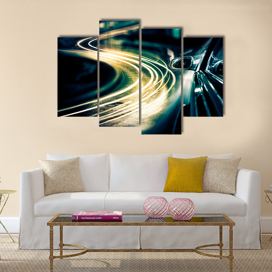 View from Side of Car Going Around Corner Multi Panel Canvas Wall Art