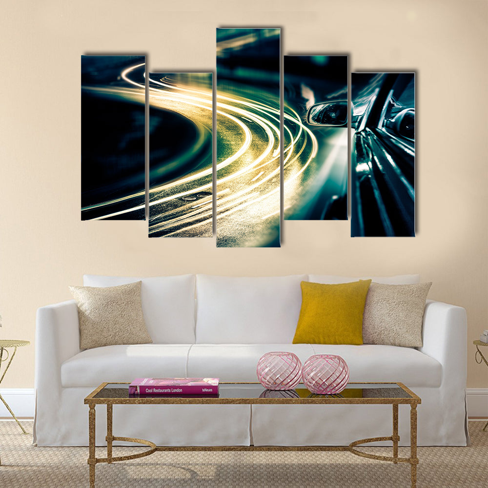 View from Side of Car Going Around Corner Multi Panel Canvas Wall Art