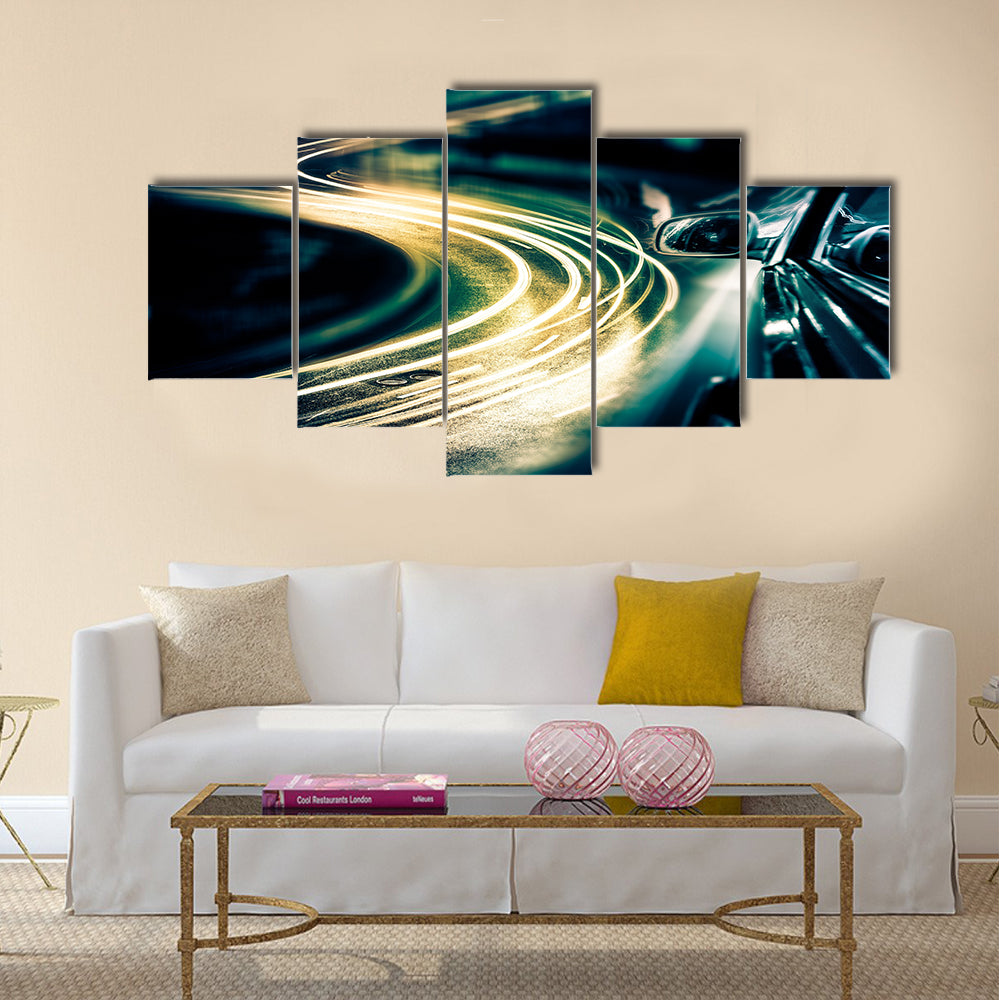 View from Side of Car Going Around Corner Multi Panel Canvas Wall Art