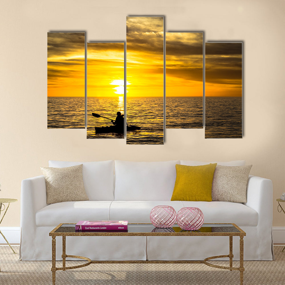 Fisherman in the kayak on the ocean  Multi panel canvas wall art