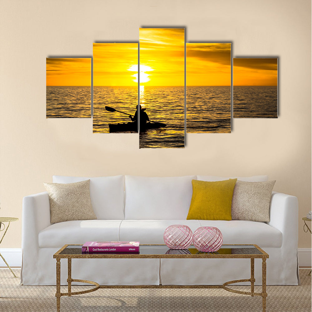 Fisherman in the kayak on the ocean  Multi panel canvas wall art