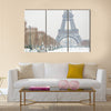 Eiffel tower covered with snow  Multi panel canvas wall art