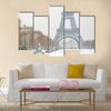 Eiffel tower covered with snow  Multi panel canvas wall art