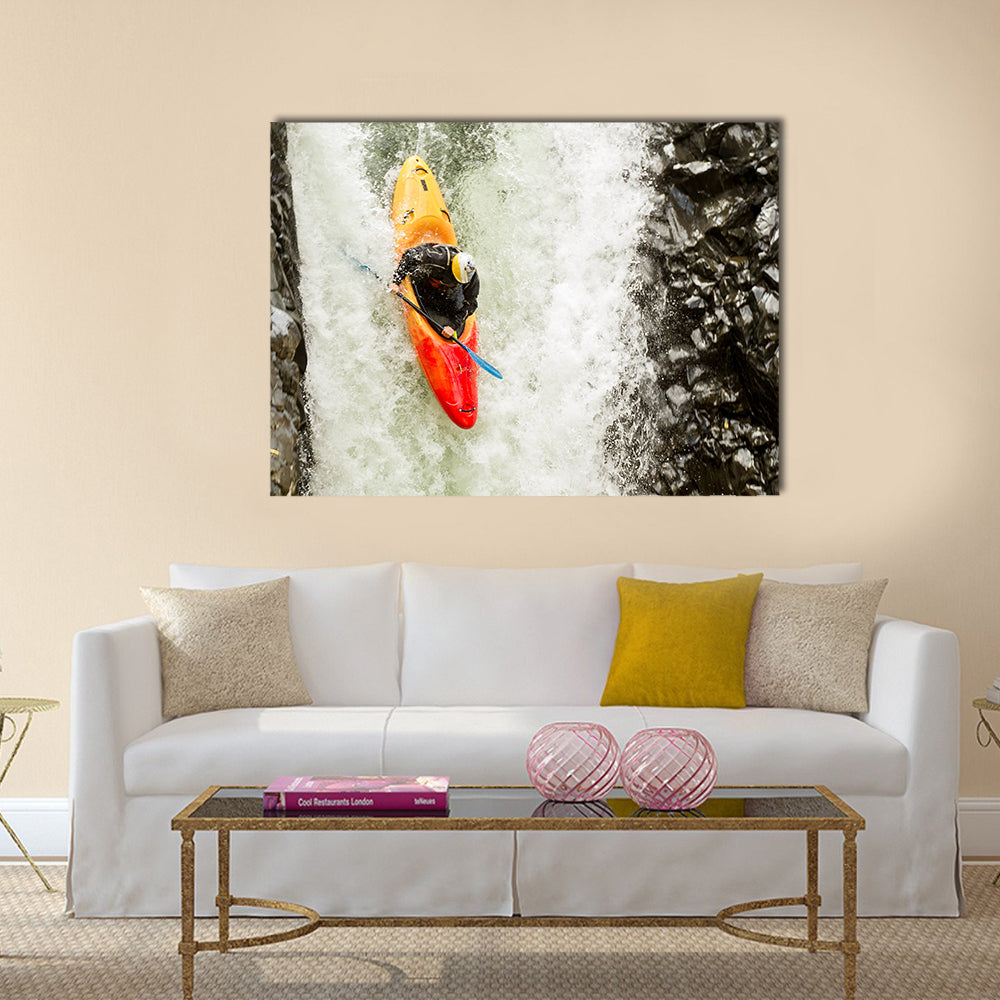 courageous kayaker in a vertical diving position Multi panel canvas wall art