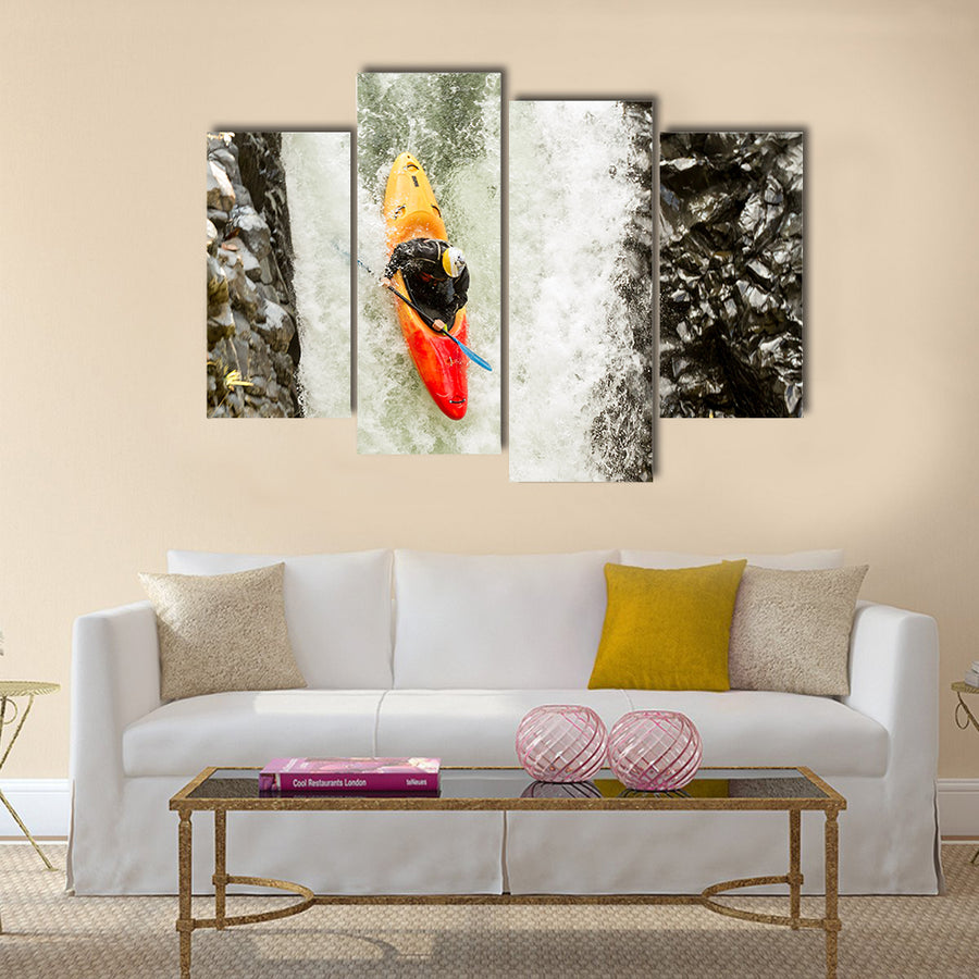 courageous kayaker in a vertical diving position Multi panel canvas wall art