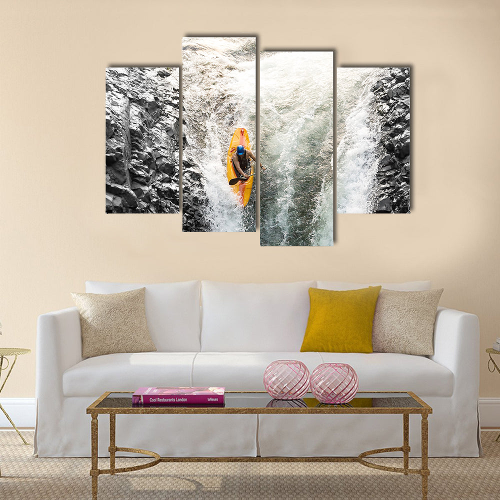 courageous kayaker in a vertical diving position Multi panel canvas wall art