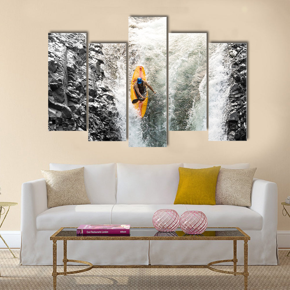 courageous kayaker in a vertical diving position Multi panel canvas wall art