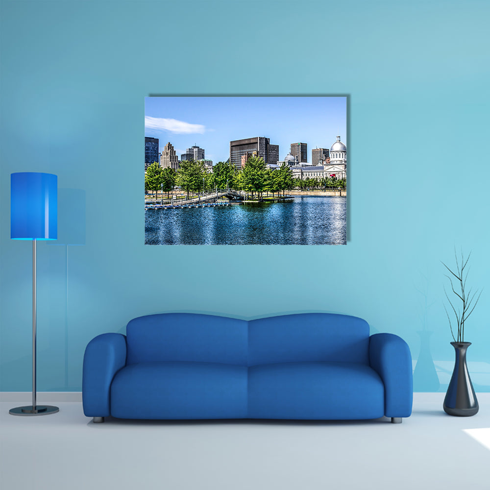 Downtown Montreal behind a lake multi panel canvas wall art