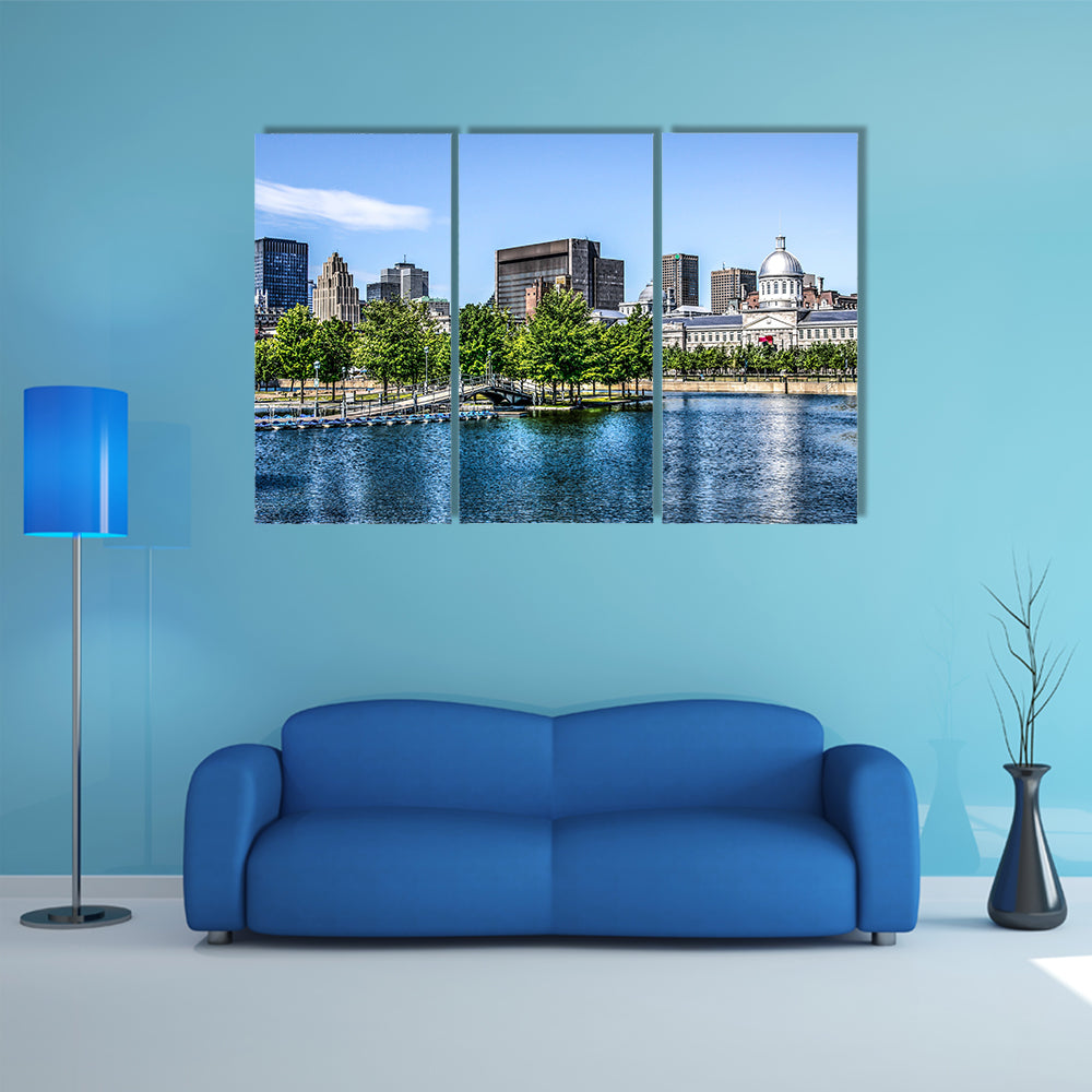 Downtown Montreal behind a lake multi panel canvas wall art
