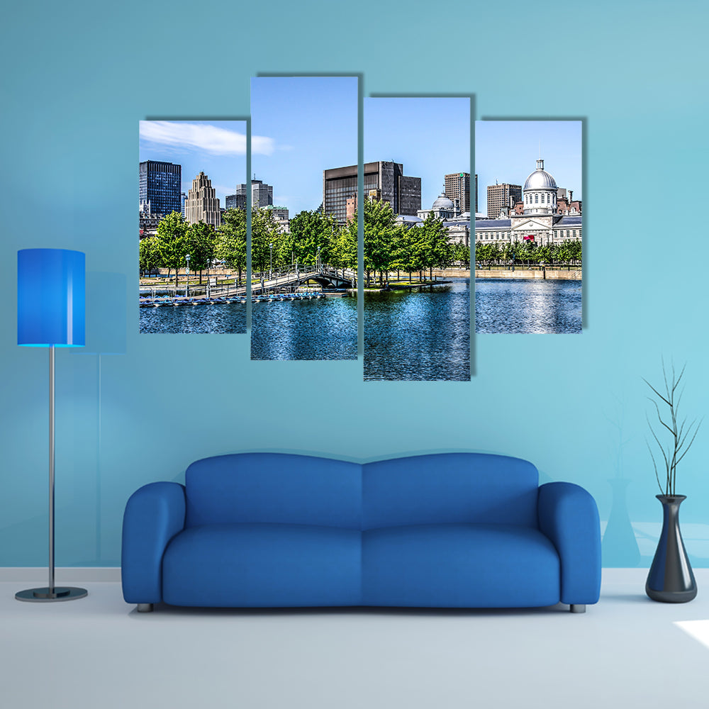 Downtown Montreal behind a lake multi panel canvas wall art