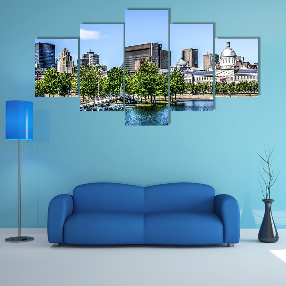 Downtown Montreal behind a lake multi panel canvas wall art