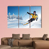 Skier in mountains, prepared piste and sunny day Multi panel canvas wall art