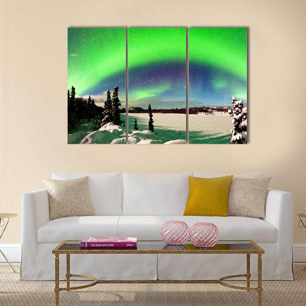 Spectacular display of intense Northern Lights or Aurora snowy winter landscape Multi panel canvas wall art