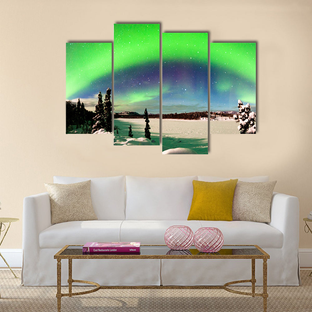 Spectacular display of intense Northern Lights or Aurora snowy winter landscape Multi panel canvas wall art