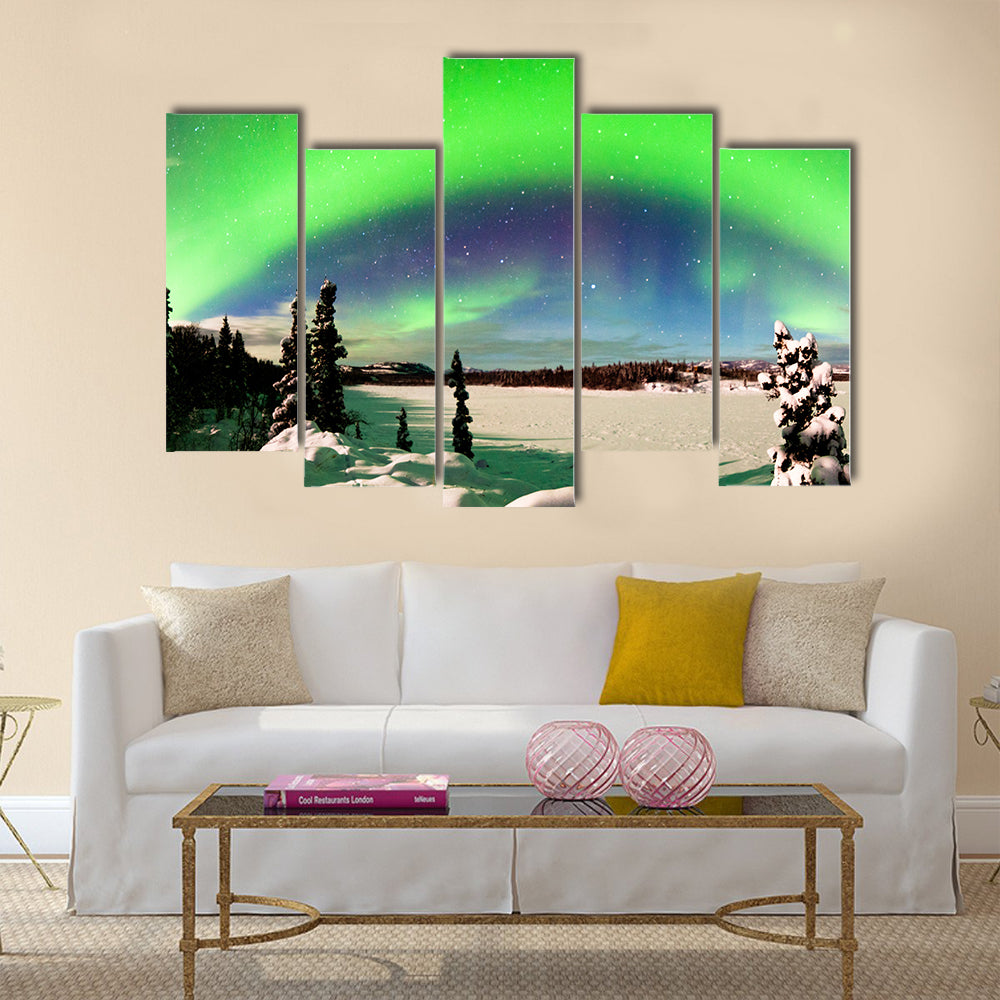 Spectacular display of intense Northern Lights or Aurora snowy winter landscape Multi panel canvas wall art