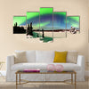 Spectacular display of intense Northern Lights or Aurora snowy winter landscape Multi panel canvas wall art