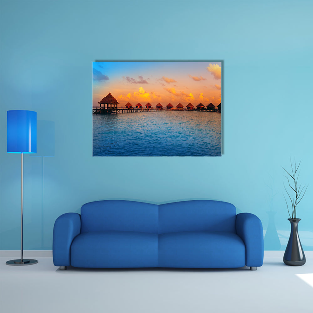The Houses On Piles On Water At The Time Of Sunset Multi Panel Canvas Wall Art