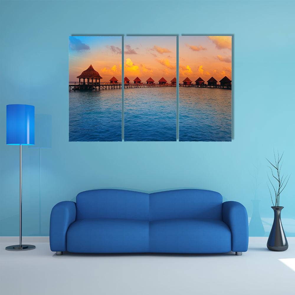 The Houses On Piles On Water At The Time Of Sunset Multi Panel Canvas Wall Art