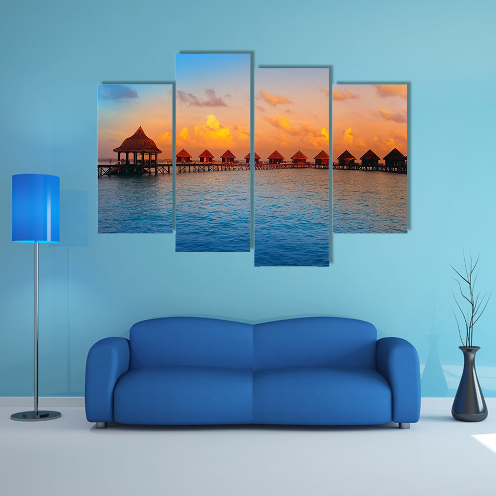 The Houses On Piles On Water At The Time Of Sunset Multi Panel Canvas Wall Art