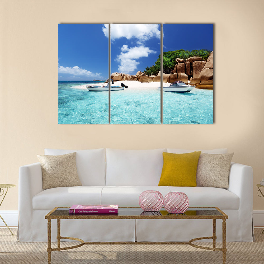 Speed boat on the beach of coco island, Seychelles Multi panel canvas wall art