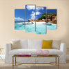 Speed boat on the beach of coco island, Seychelles Multi panel canvas wall art