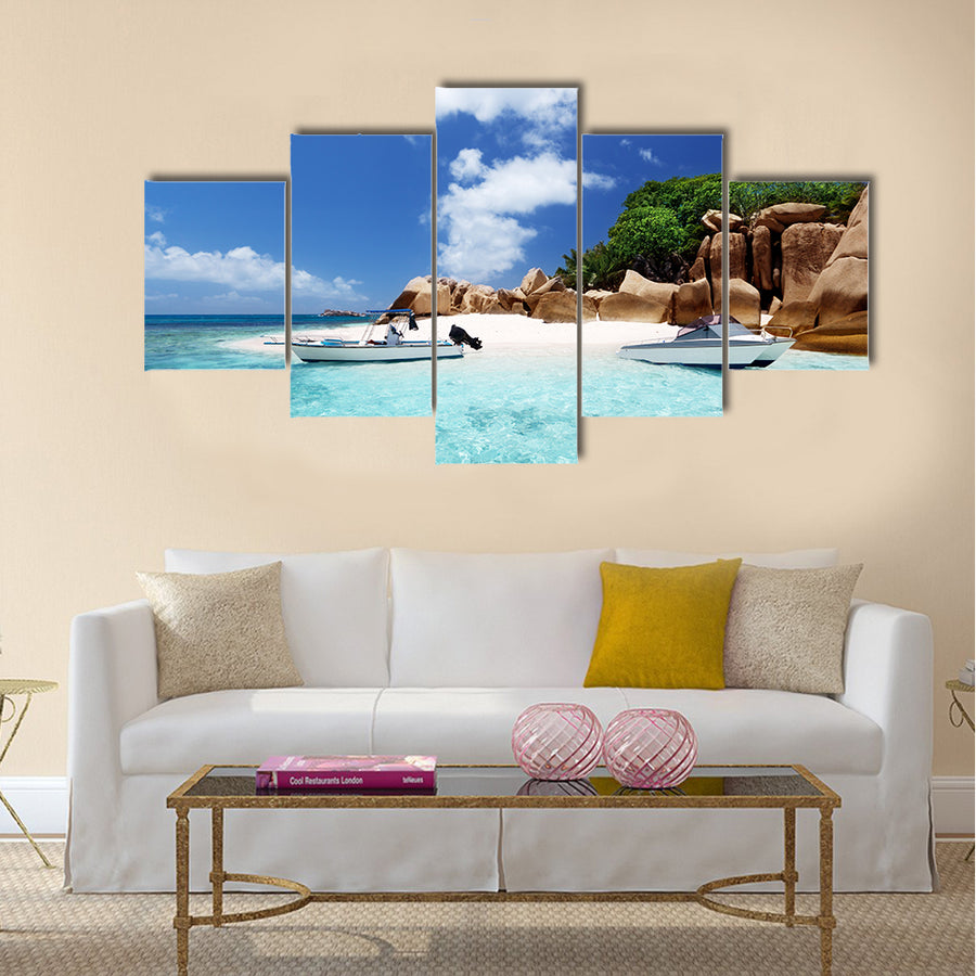 Speed boat on the beach of coco island, Seychelles Multi panel canvas wall art