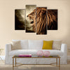 Roaring lion against stormy sky Multi panel canvas wall art