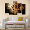 Roaring lion against stormy sky Multi panel canvas wall art