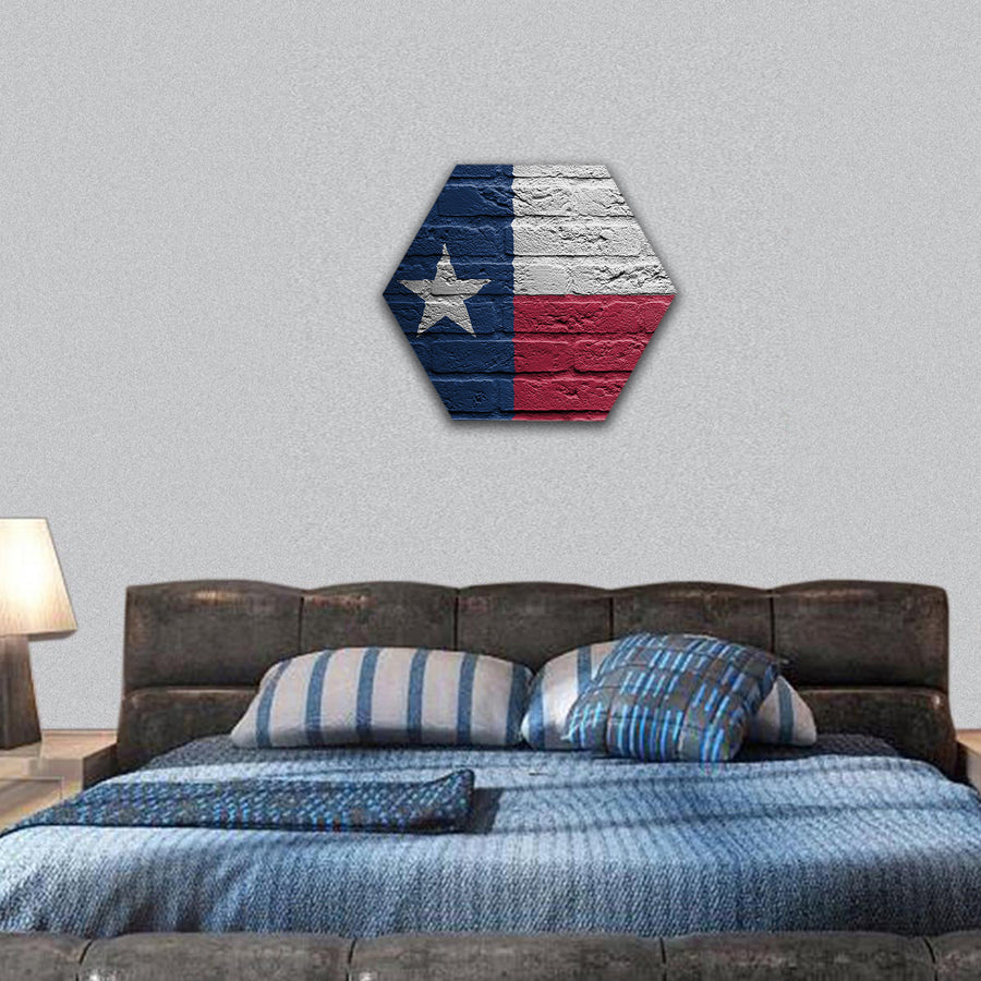 Brick wall with a painting of a flag isolated, Texas hexagonal canvas wall art