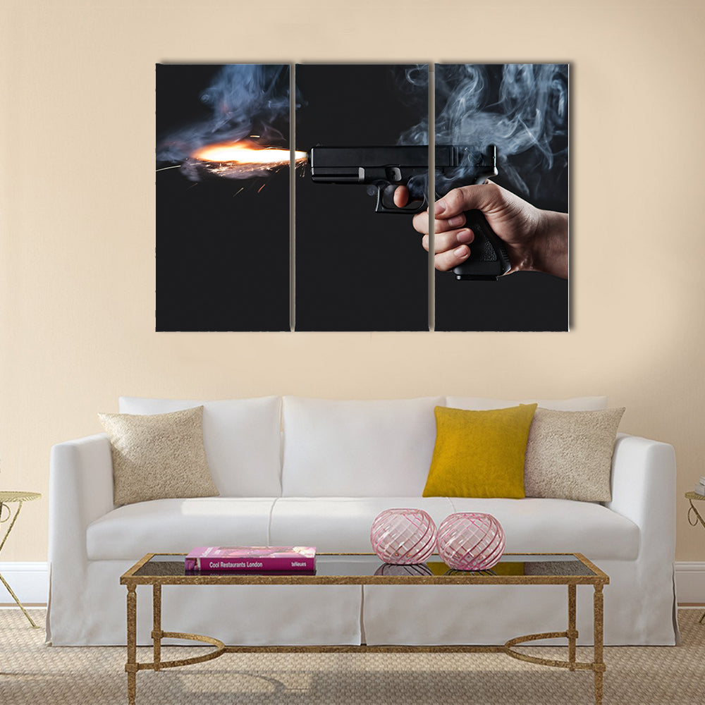shot from a handgun with fire and smoke multi panel canvas wall art