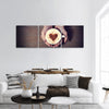 Woman holding hot cup of coffee, with heart shape panoramic canvas wall art