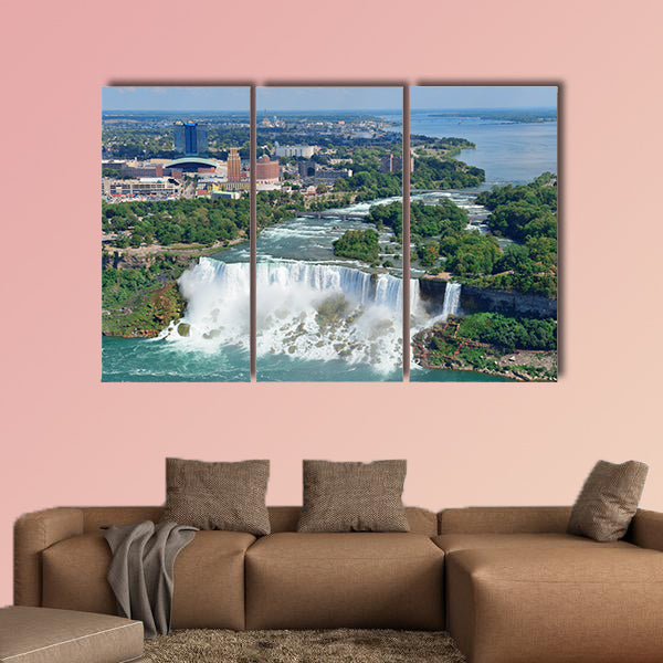 Niagara Falls closeup in the day over river with buildings wall art
