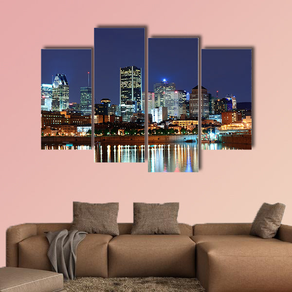 Montreal over river at dusk with city lights and urban buildings wall art