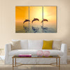 Awesome Jumping Dolphins Multi Panel Canvas Wall Art