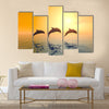 Awesome Jumping Dolphins Multi Panel Canvas Wall Art