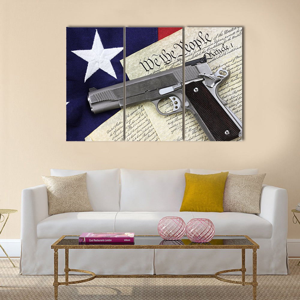 Handgun lying over a  American flag multi panel canvas wall art