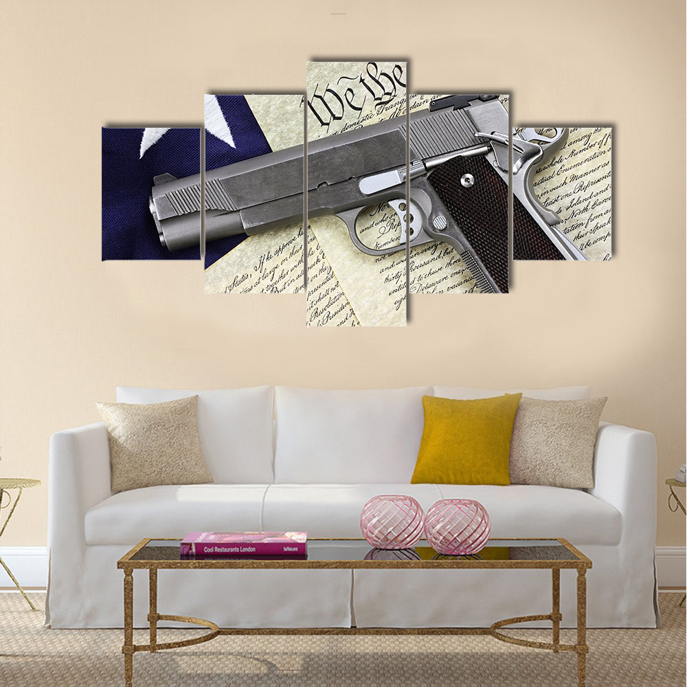 Handgun lying over a  American flag multi panel canvas wall art