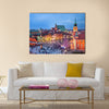 Beautiful Old Town of Warsaw in Poland illuminated at evening, during Christmas time Multi panel canvas wall art