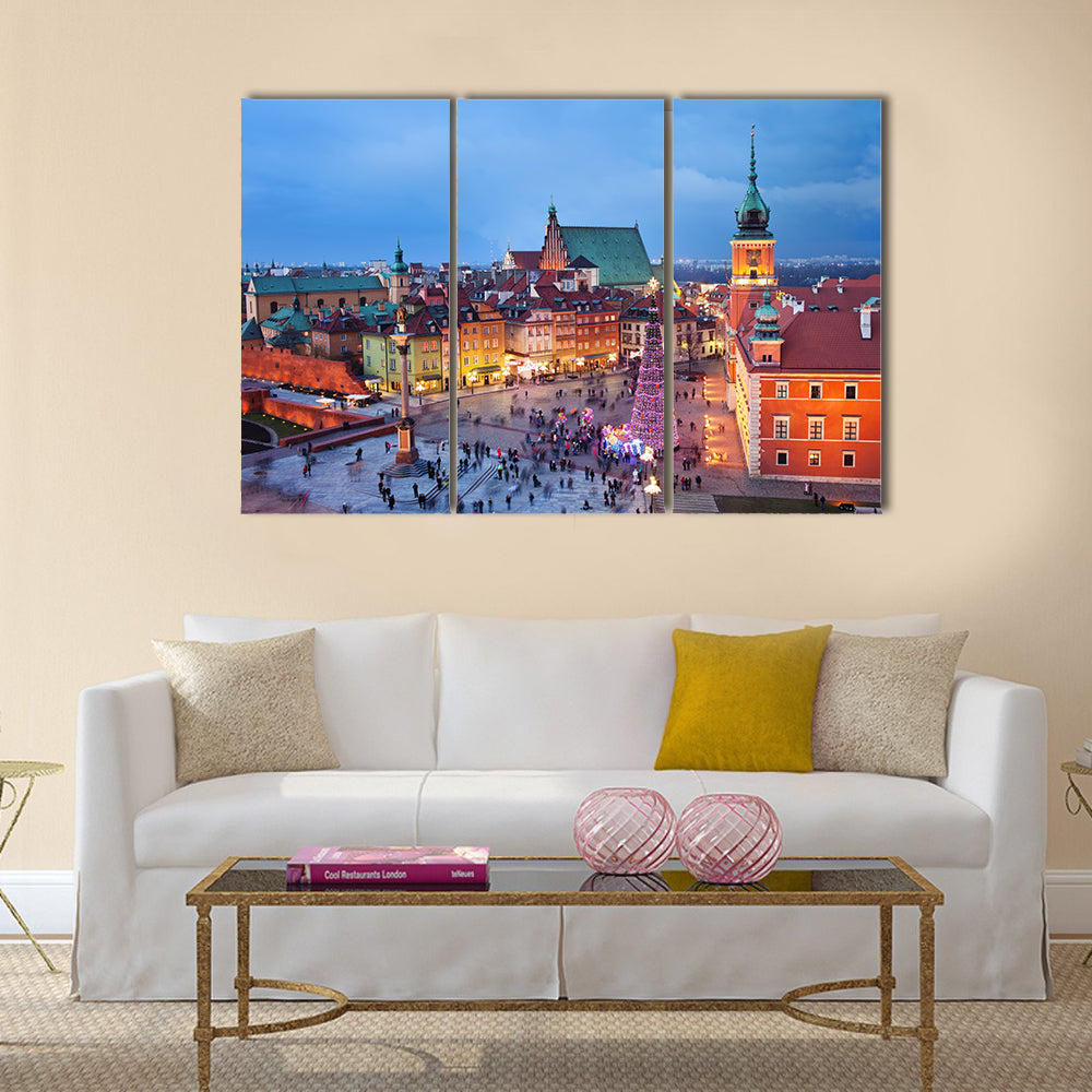 Beautiful Old Town of Warsaw in Poland illuminated at evening, during Christmas time Multi panel canvas wall art