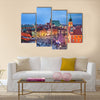 Beautiful Old Town of Warsaw in Poland illuminated at evening, during Christmas time Multi panel canvas wall art