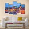 Beautiful Old Town of Warsaw in Poland illuminated at evening, during Christmas time Multi panel canvas wall art