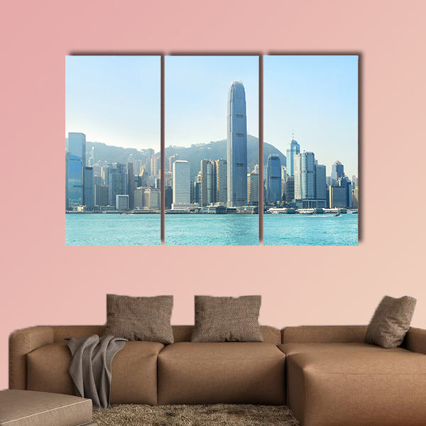 Hong Kong business center with a clear blue sky multi panel canvas wall art
