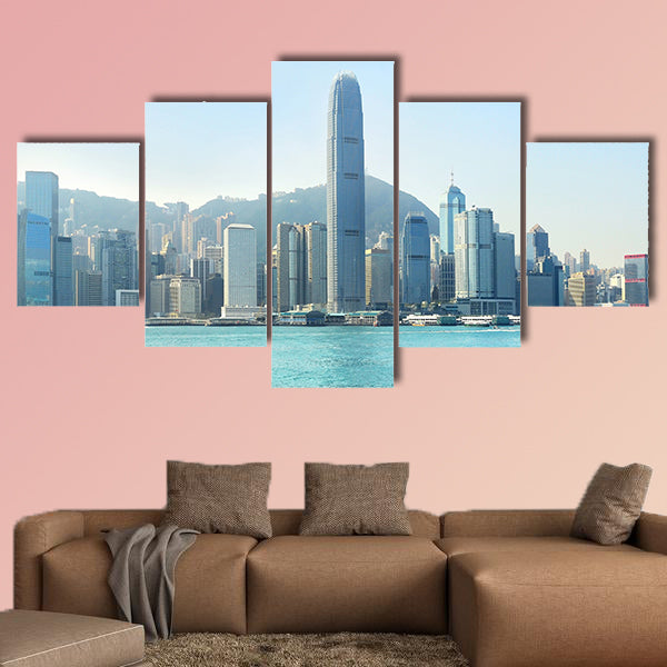 Hong Kong business center with a clear blue sky multi panel canvas wall art
